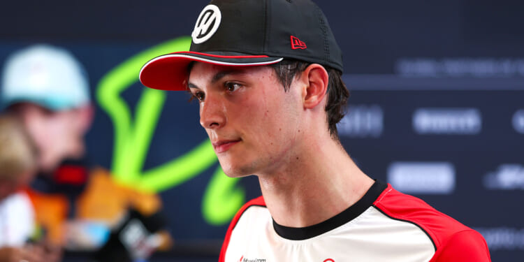 Brit F1 star Oliver Bearman dangerously close to race ban as he's caught in tense conversation with Liam Lawson