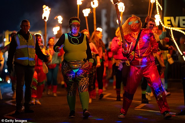 Bonfire societies take part a parade during the annual Edenbridge bonfire night celebrations on November 8, 2025 in Edenbridge, England