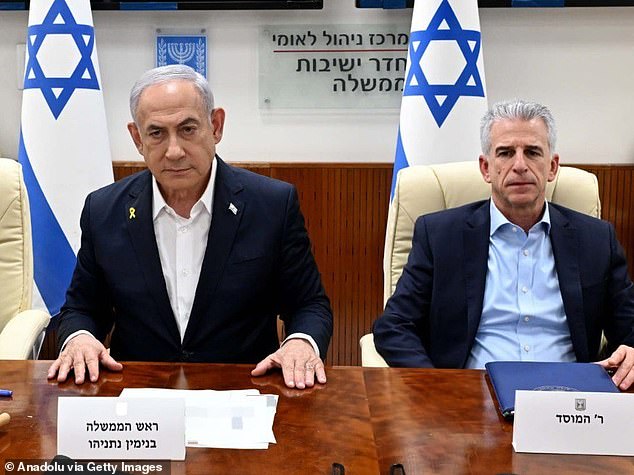 Netanyahu with the director of Mossad David Barnea.  There are allegations that the woman who accused Khan was a 'plant' by Mossad  and that her claims were a calculated attempt to discredit the controversial prosecutor
