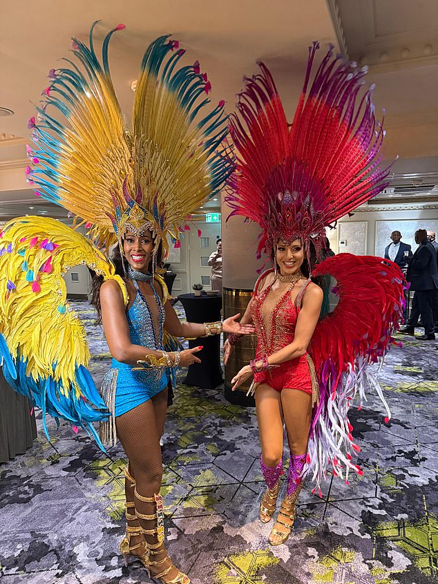 A live singer, DJ and exotic dancers with headdresses performed at the glitzy event