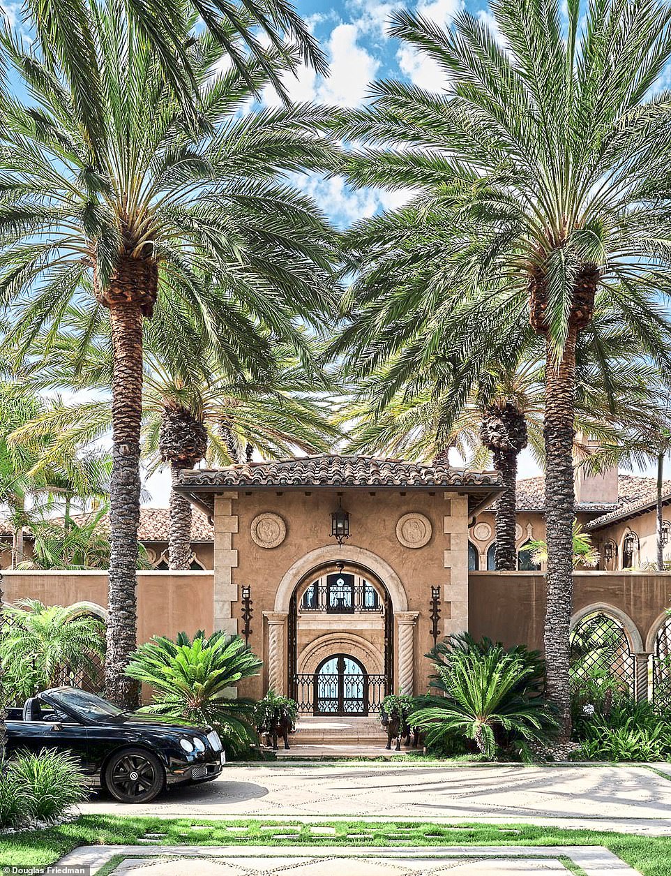 The driveway, where Cher’s Bentley is parked, has a smart interior courtyard – the singer’s star sign, Taurus, informed her choice of vintage bronze bulls either side of the entrance. The property references Venetian palazzos, Renaissance villas of Europe and the Moorish features of the Alhambra palace.