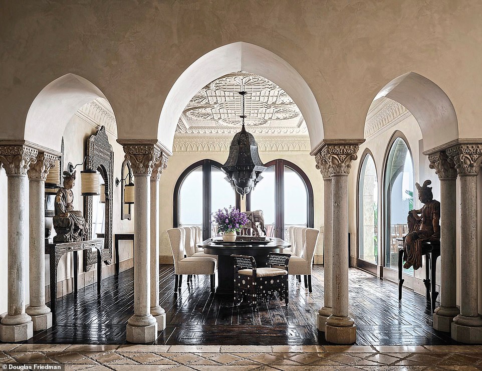 The house, built in 1999, was designed by Cher’s long-term friend and designer Ron Wilson. Martyn Lawrence Bullard, whose clients also include Elton John, Kylie Jenner and Eva Mendes, came on board 16 years later. The dining-room ceiling is made of painted tin panels; the walls are hand-trowelled plaster.