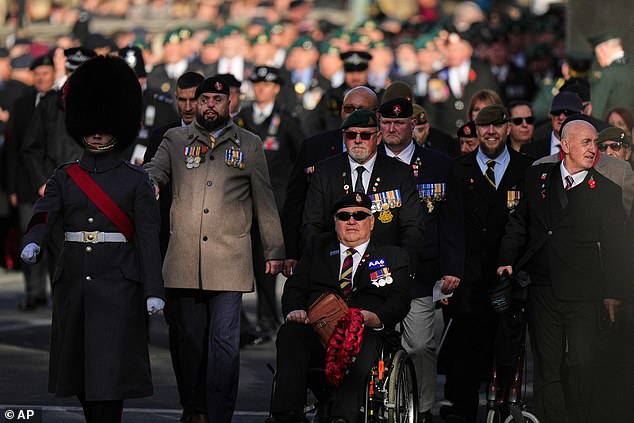 Veterans arrive for the Remembrance Sunday Service at the Cenotaph in London, Sunday, Nov. 9, 2025.(AP Photo/Alastair Grant, Pool)