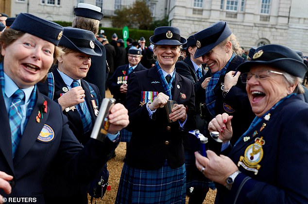 Women's Royal Air Force (WRAF) veterans gather on Horse Guards Parade ahead of the Royal British Legion's March Past the Cenotaph on Remembrance Sunday in London, Britain, November 9, 2025. REUTERS/Kevin Coombs
