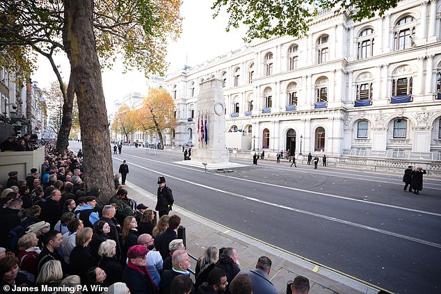 People gather on Whitehall ahead of the Remembrance Sunday service at the Cenotaph in London. Picture date: Sunday November 9, 2025. PA Photo. Photo credit should read: James Manning/PA Wire
