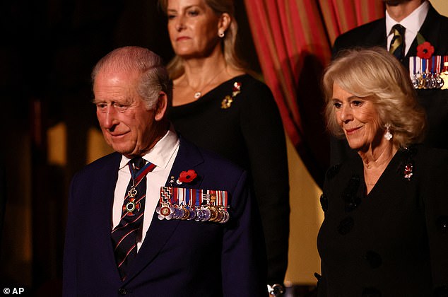 Britain's King Charles, Queen Camilla, and Sophie, Duchess of Edinburgh attend the Royal Albert Hall for the Royal British Legion Festival of Remembrance, an annual event honouring military service members, which holds special significance in 2025 as it marks the 80th anniversary of the end of World War Two, at the Royal Albert Hall in London, Nov. 8, 2025. (Jack Taylor/Pool Photo via AP)