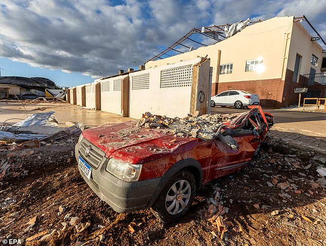 A vehicle destroyed by a tornado in Rio Bonito do Iguacu, Brazil, 08 November 2025