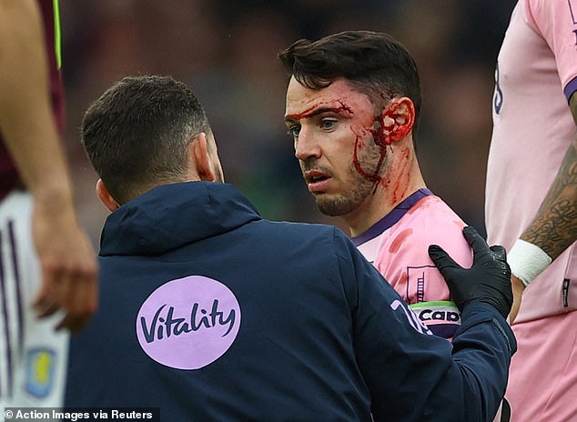 Bournemouth captain Adam Smith had blood pouring from his head after the collision
