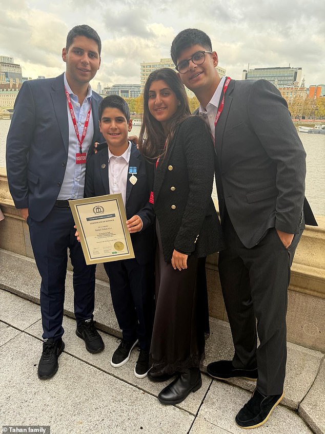 Rafael (pictured at the Houses of Parliament, Westminster, with his family) won a British Citizen Youth Award