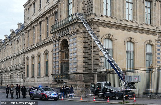 The robbers entered the museum using a furniture elevator on the morning of October 19. Pictured: Police probing the scene after the heist