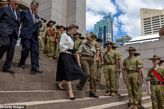 Many uniformed military officers greeted Princess Anne as she exited the ANZAC Memorial