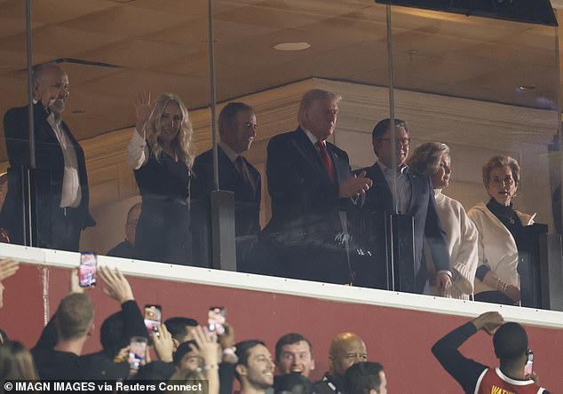 Trump took his seat in the stadium shortly before the halftime interval at the game