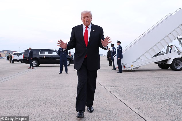 Trump pictured after touching down following the stunning flyover in Washington