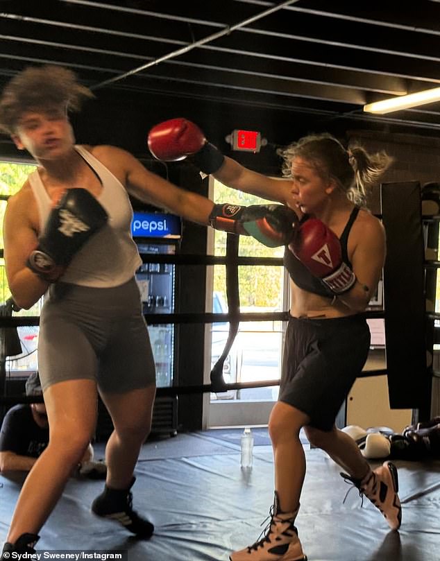 Sweeney pictured opposite co-star Katy O'Brian, who portrays boxer Lisa Holewyne