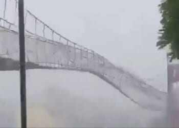 Terrifying moment super typhoon rattles bridge like it’s made of paper as storm kills 8 & displaces 1.4m in Philippines