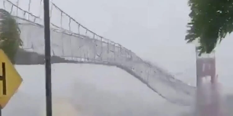 Terrifying moment super typhoon rattles bridge like it’s made of paper as storm kills 8 & displaces 1.4m in Philippines