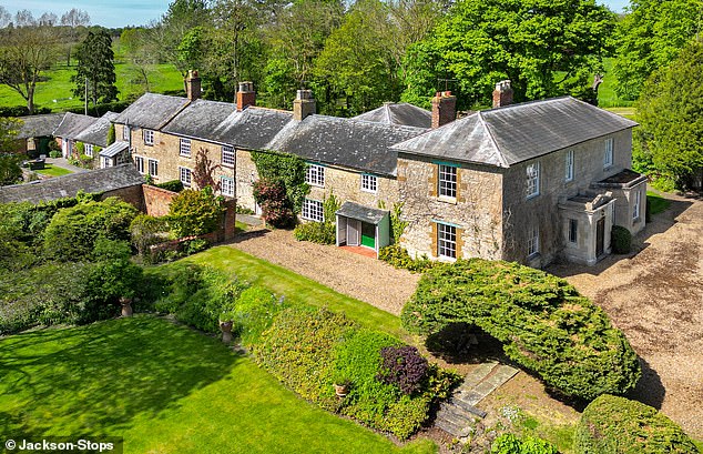 Jackson-Stops is marketing this eight bedroom manor house with more than 9,000 square feet of living space and 2.5 acres of land for £1.7million