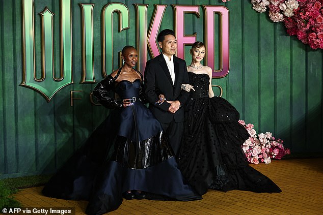 Joined by the film's director Jon M. Chu, Ariana and Cynthia showed off their glamorous gowns as they arrived for the premiere