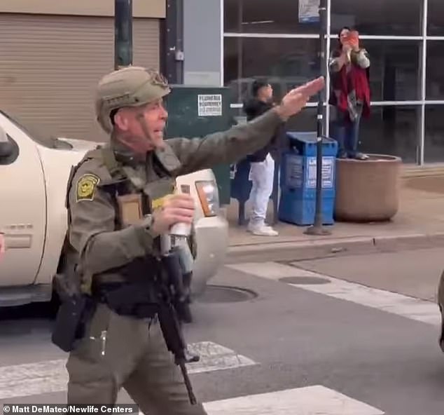 A federal agent was recorded on a street in Little Village as residents clashed with ICE