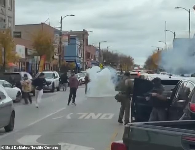 Smoke bombs were apparently set off in the street, as captured by a witness video