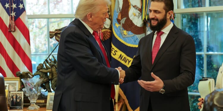 Donald Trump hosts ex-Jihadi fighter in historic Oval Office meeting as new Syrian leader pledges to take on ISIS