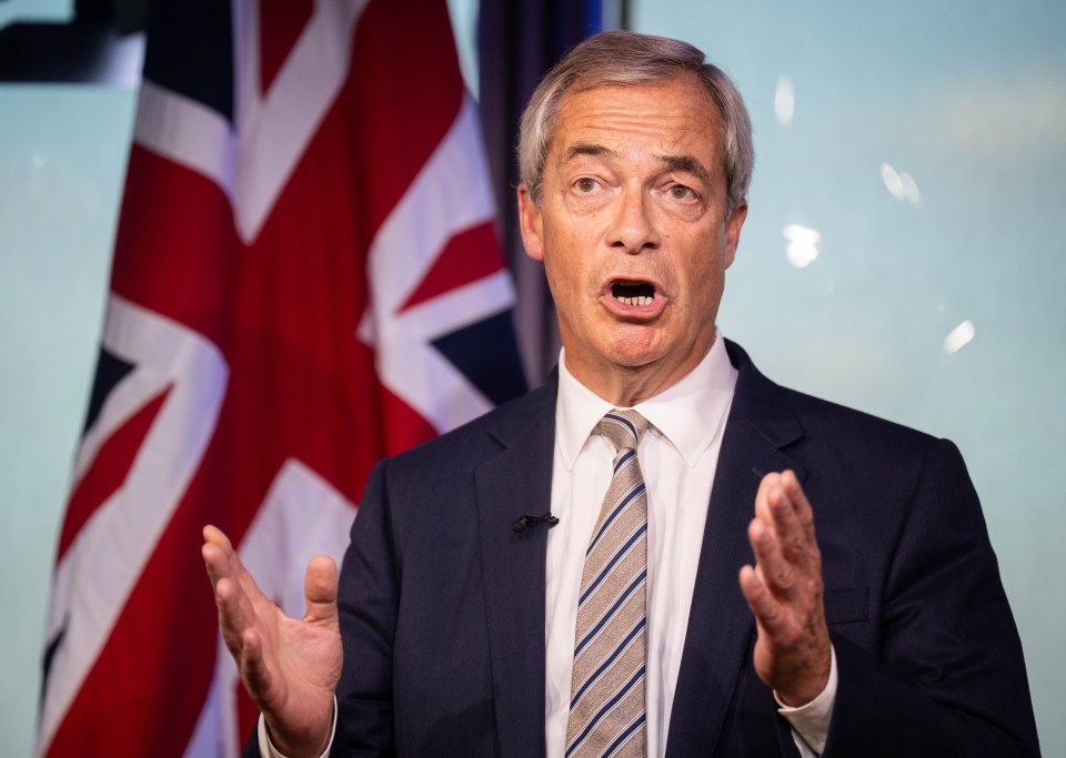 Reform UK leader Nigel Farage speaking with his mouth open and hands raised, in front of a Union Jack flag.