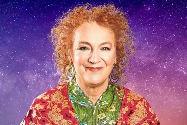 Maggie Innes smiling, with a starry purple and pink background.