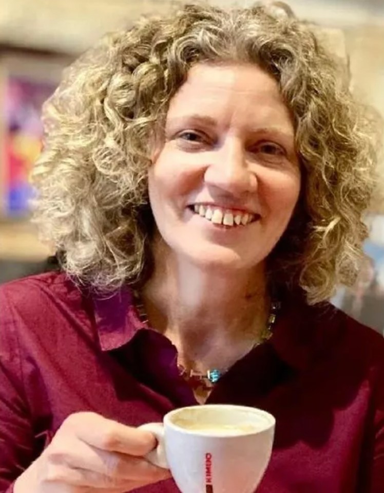 Lynda Shahwan, a BBC journalist, holding a cup of coffee.