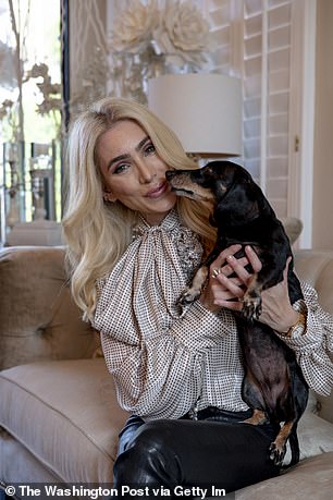 Melissa Rein Lively poses for a portrait at her home in Scottsdale, Ariz. in 2020 after live streaming herself destroying a mask display at a local Target.