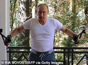 Putin is pictured working out in 2015