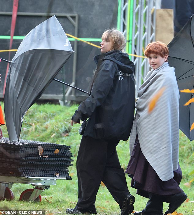 Ron Weasley star Alastair Stout was seen walking through the set, showing off the character's iconic shock of bright red hair