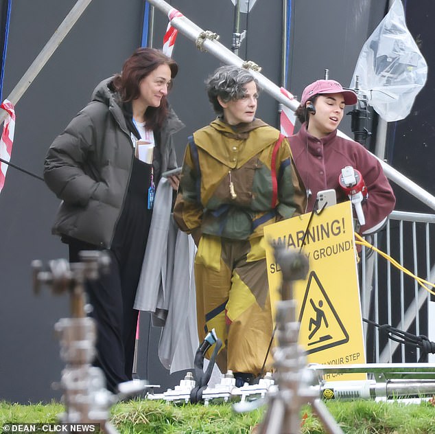 Louise was flanked by aides during filming the scenes of Harry's first flying lesson