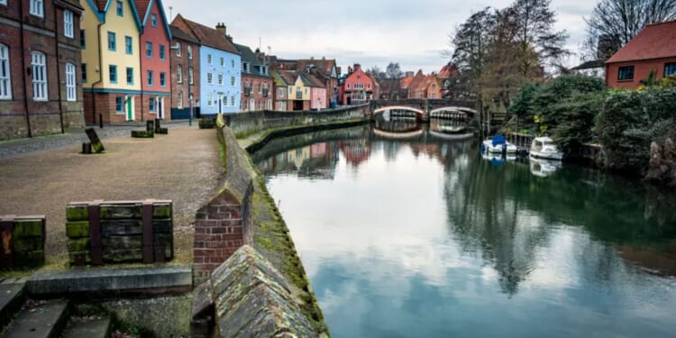 Body pulled from river in UK city as locals tell of man wearing a 'high-vis jacket' being removed by boats