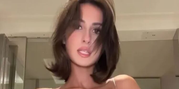 Bianca Censori's sister Angelina stuns as she goes braless in see-through lace dress