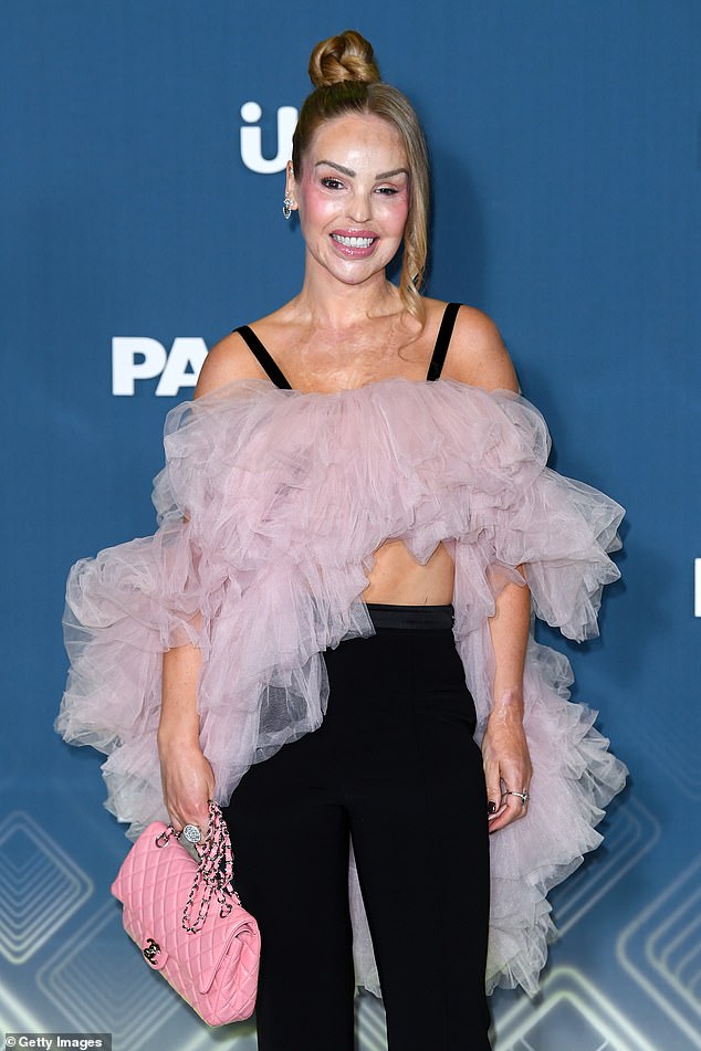 Katie beamed for the camera