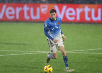 Stockport vs Wigan SUSPENDED as Vertu Trophy clash battered by torrential downpour and ball barely moving