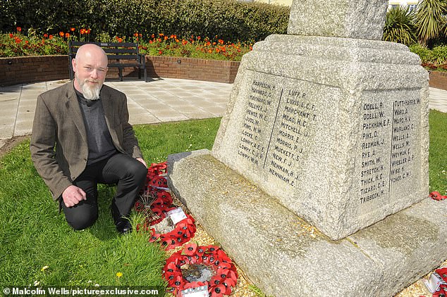 Parents then accused Rev Dr Paul Chamberlain of 'ruining' Christmas with his comments about Father Christmas. Pictured is Rev Chamberlain in 2018, with the town's war memorial
