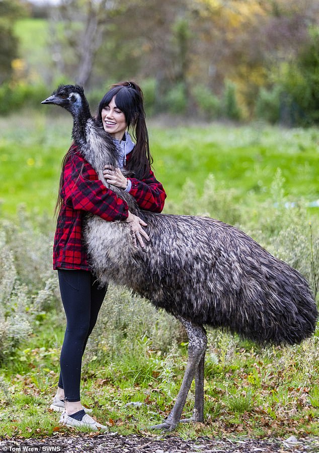Big bird: Now Rhi is responsible for three-year-old EJ, who looms over her at more than six feet tall and requires daily attention