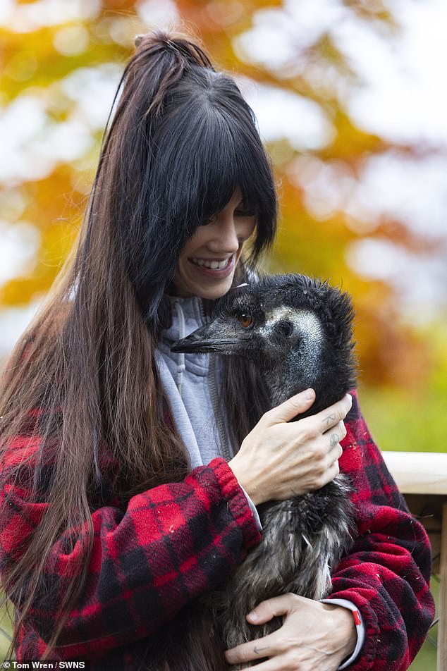 Rhi named the bird EJ, which stands for Emu Jonathan, after assuming the emu was male - though the vet later corrected her