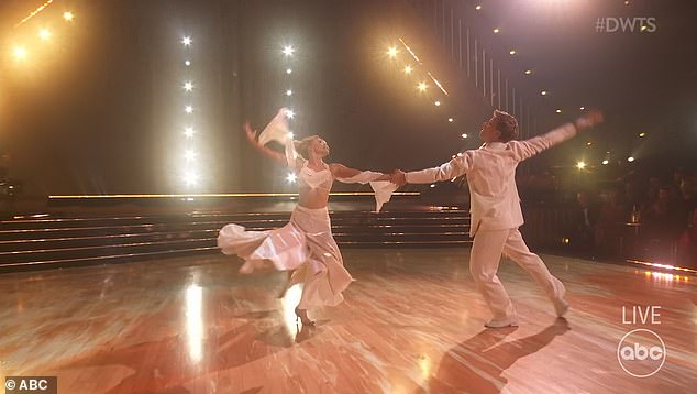 Robert, who had watched his sister's dance with tears in his eyes a decade earlier, performed in all white like she and Derek had done