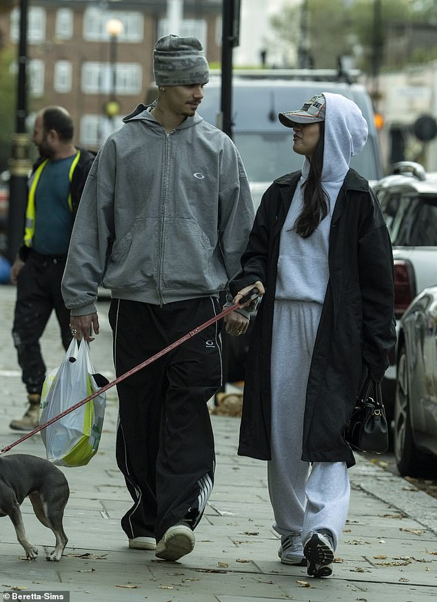 But during their outing in fancy Notting Hill they locked lips and walked arm in arm before hopping back into his luxury vehicle to head off
