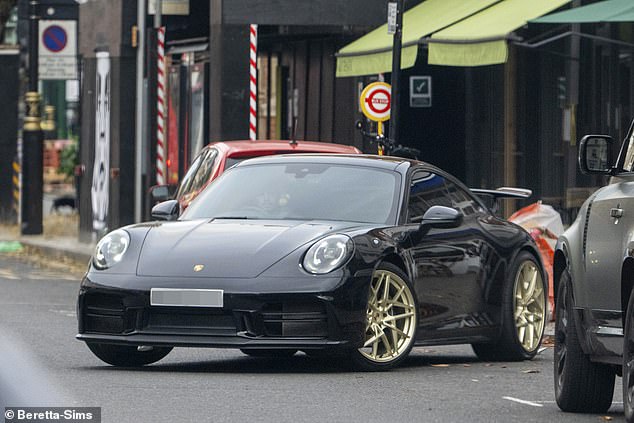 It certainly appears his wheels have been redone in a gold casting while it also sports a custom spoiler