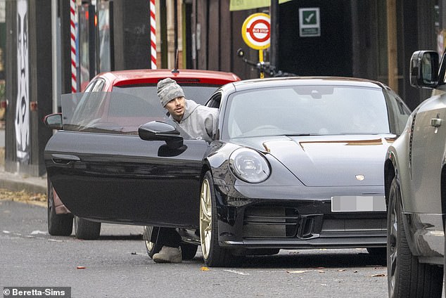 He was flaunting the luxury vehicle