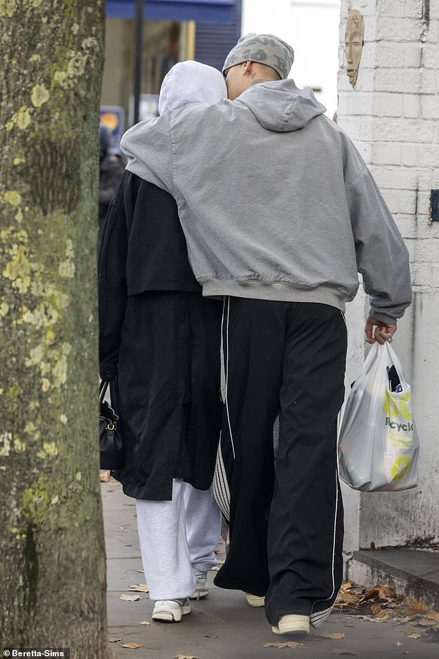 He gave her a kiss on the cheek as they walked