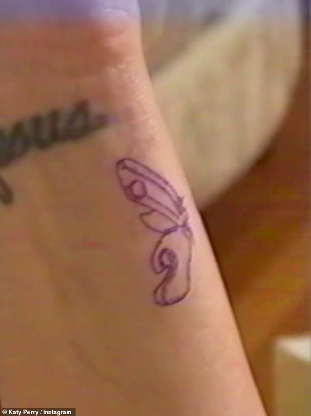 The hitmaker took to Instagram as she received the inking ahead of her final Lifetimes Tour show in Madrid