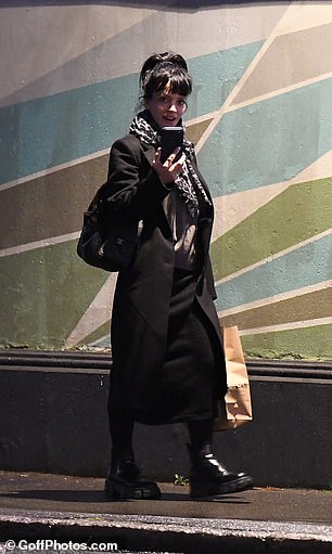 The star carried a takeaway bag from the restaurant