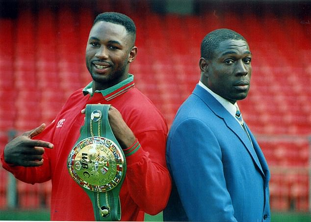 Bruno pictured with Lennox Lewis in 1993. 'I don't have a relationship with him,' Bruno says. 'He's a snake'