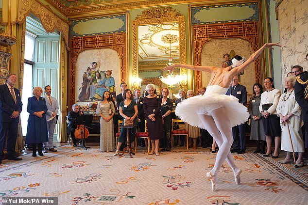 Camilla looked moved as she watched Ms Lee perform The Dying Swan in the centre of the room, alongside guests including Arlene Phillips, 82, and TV presenter Angela rippon, 81