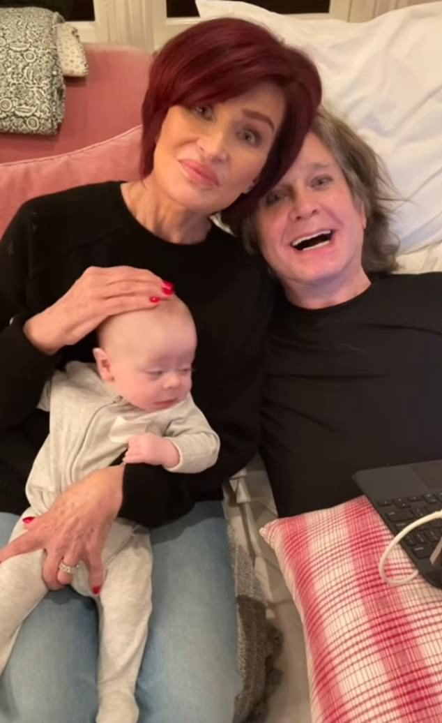 Sharon pictured with Ozzy and one of their grandchildren