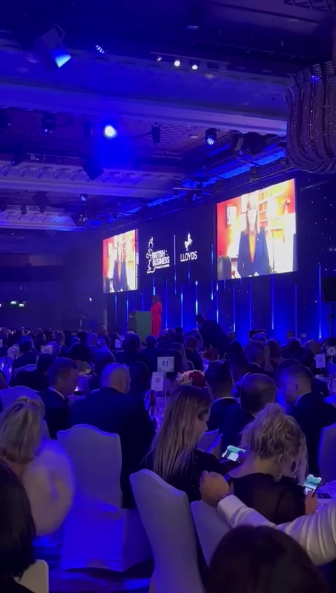 Business chiefs watch a pre-recorded speech by Rachel Reeves at an awards event at the Grosvenor House Hotel.